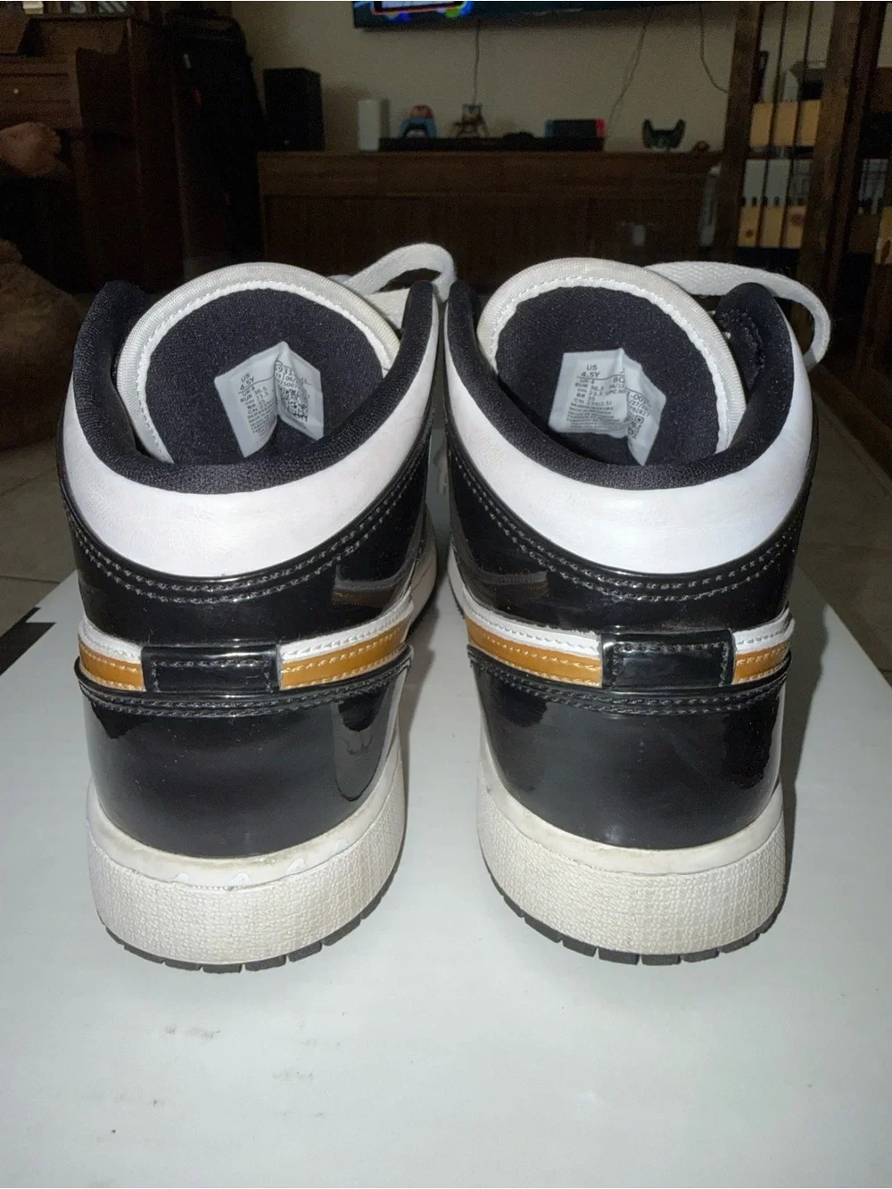 Nike High-Top Sneakers in White, Black & Gold